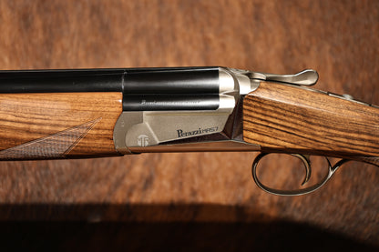 close up of Perazzi MR57S left side view with engraving, for sale at Berg's Outdoors
