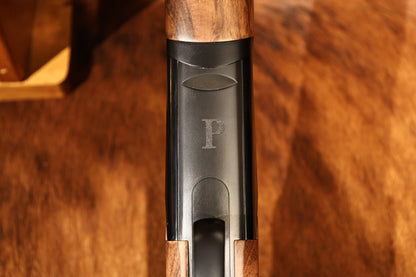 close-up of Perazzi MR57 Sporting bottom view with hand engraved P, for sale at Berg's Outdoors