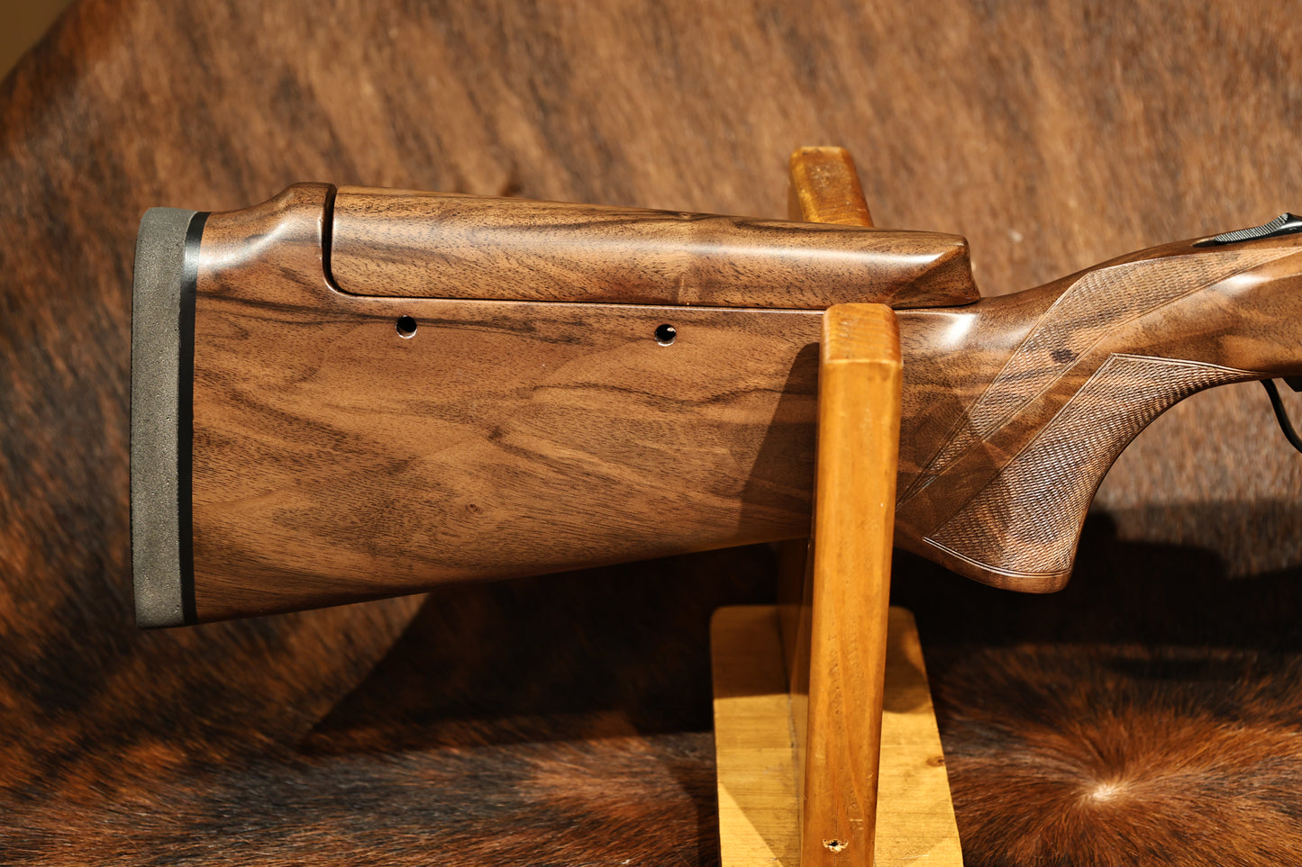 close-up of Perazzi MR57 Sporting right side of stock, for sale at Berg's Outdoors